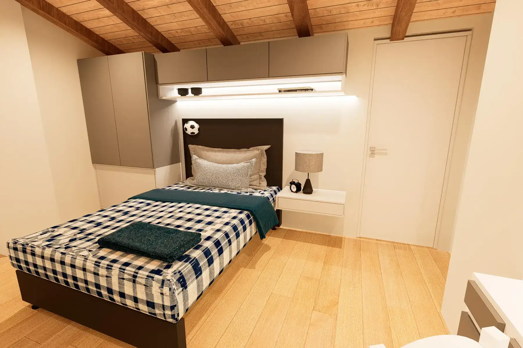 camera-da-letto-con-armadiature-su-misura Progetto camera da letto singola mansardata con travi in legno a vista, armadio componibile e pavimento in parquet chiaro